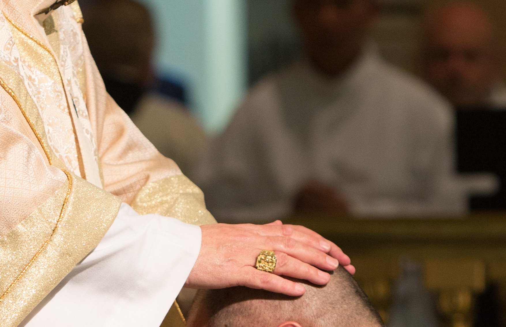 Laying on of hands Picture shows the Ordaining Bishop laying his hands on the candidate to be ordained a deacon